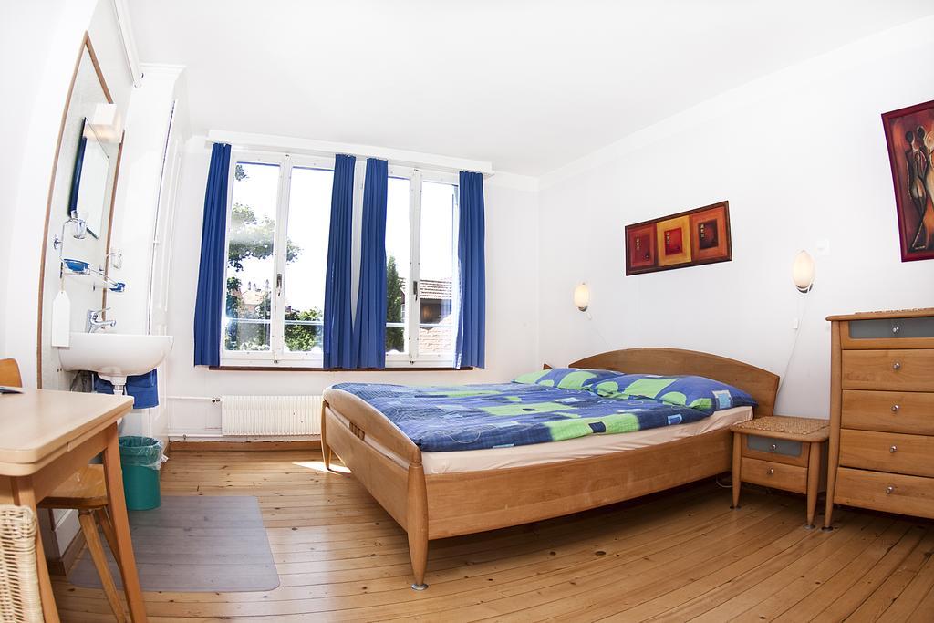 Happy Inn Lodge Interlaken Rum bild