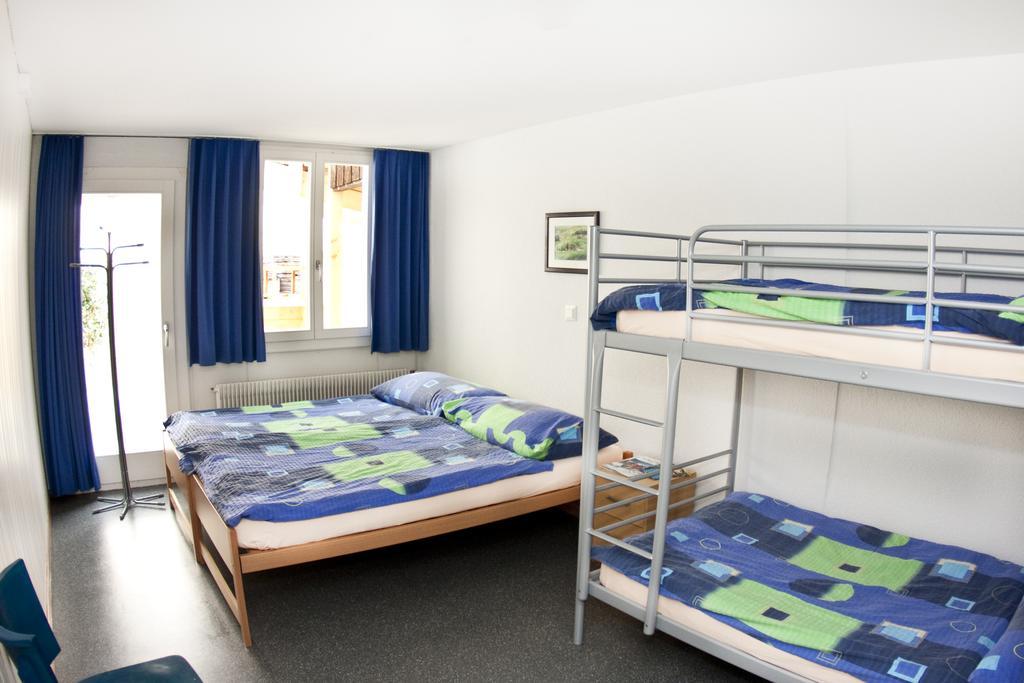 Happy Inn Lodge Interlaken Rum bild